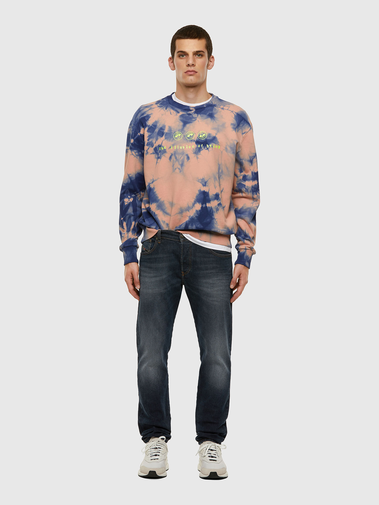 pink shirt blue sweater
