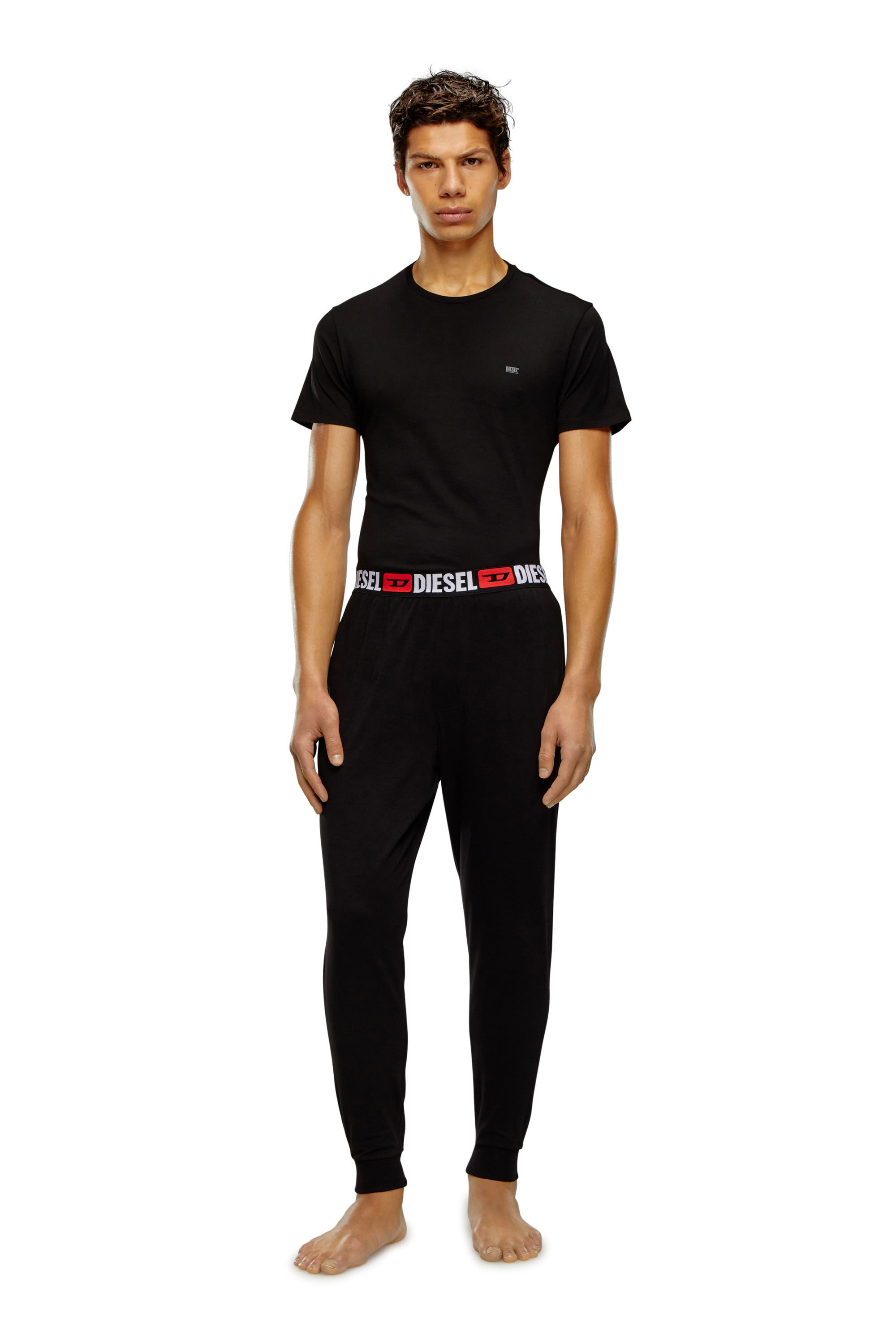 Diesel - UMLB-JULIO, Man Track pants with logo waist in Black - Image 4