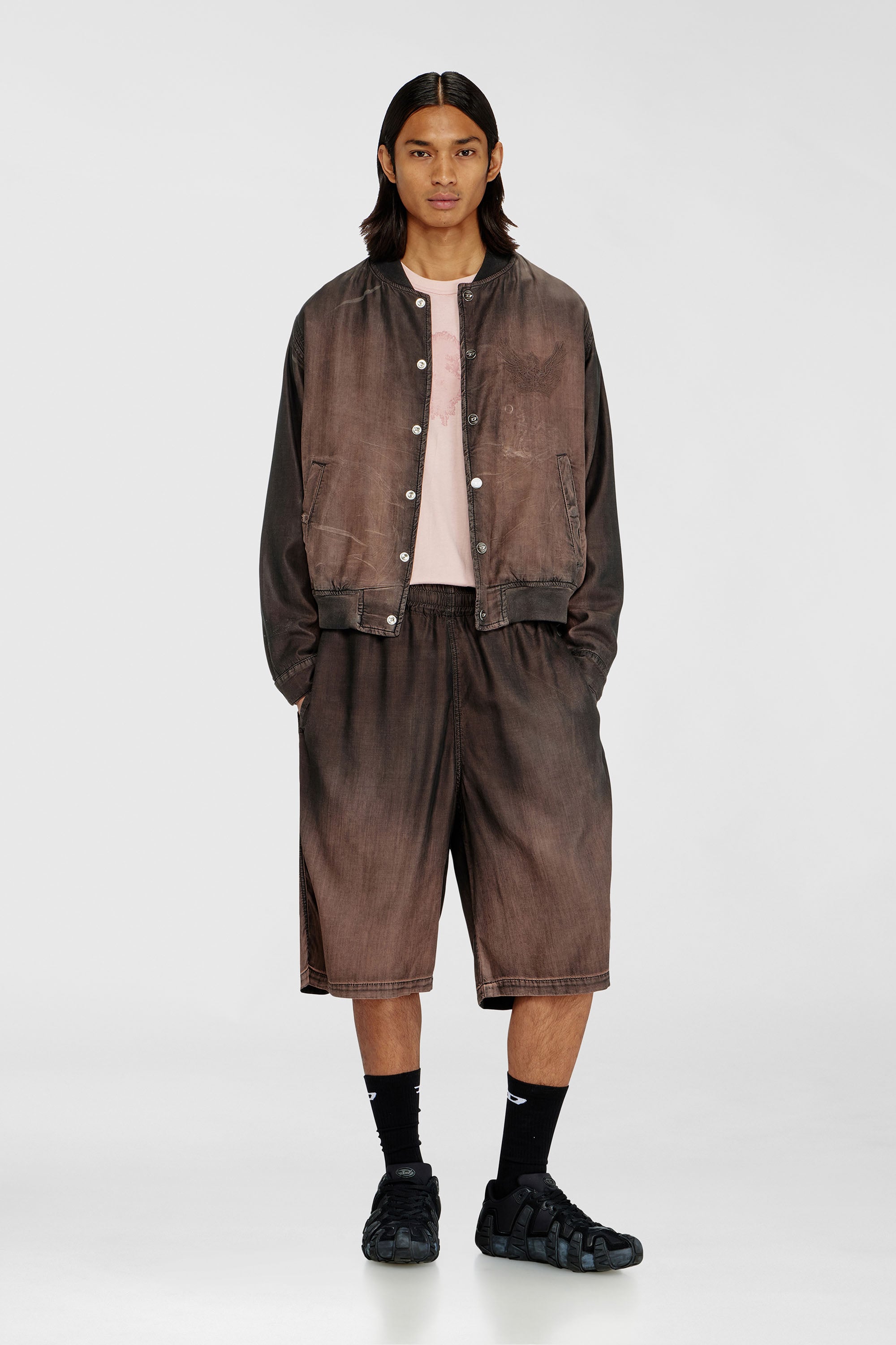 Relaxed bermuda shorts in fluid coated denim